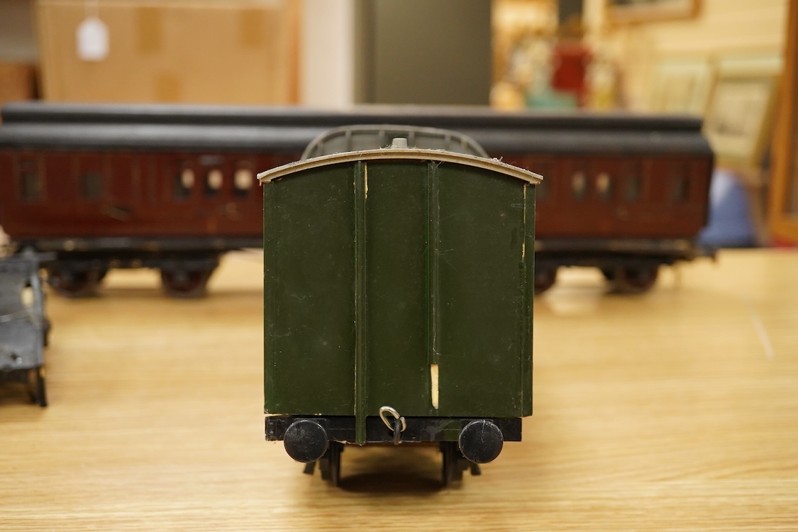 Two Gauge One bogie coaches; a Midland Railway clerestory coach, together with a 12-wheel Pullman car (bogies af), plus an American outline caboose, some scratch building and adaptation from kits, etc.